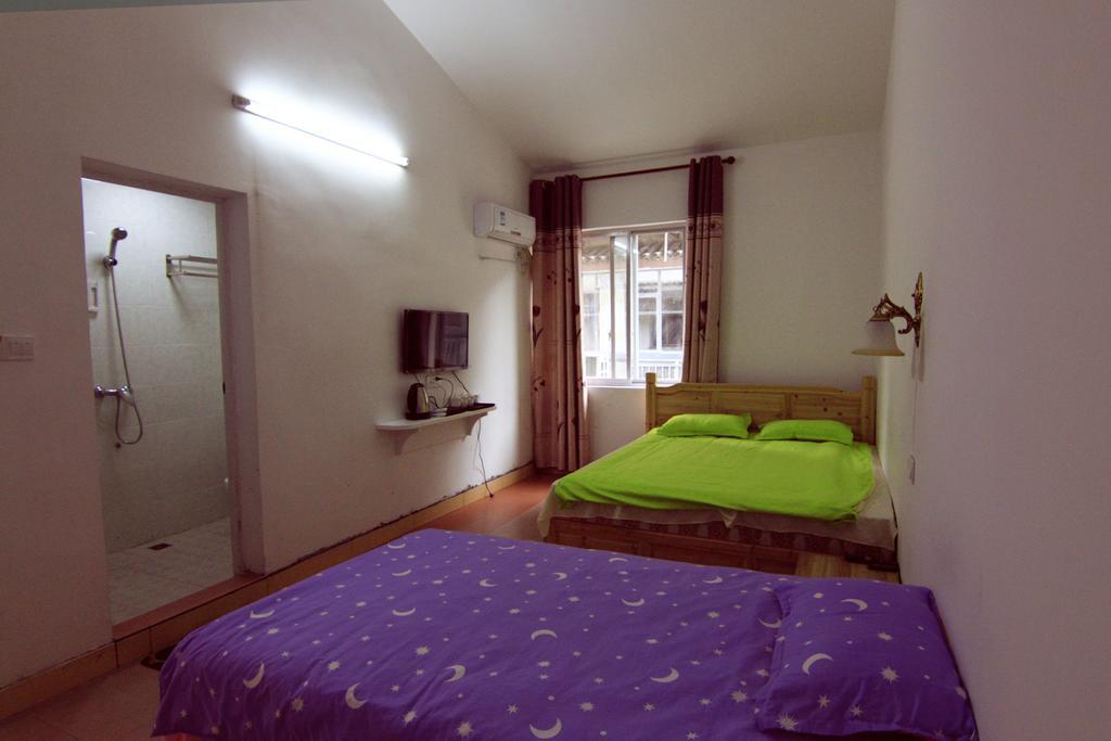 Lan Shan Chu Youth Hostel Yangshuo Quarto foto