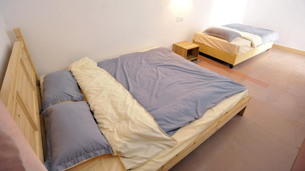 Lan Shan Chu Youth Hostel Yangshuo Quarto foto